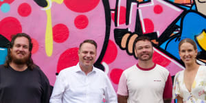 From left:Brisbane artist Matt Tervo,Lord Mayor Adrian Schrinner,muralist Fintan Magee and Lisa Atwood,councillor for Doboy Ward,at the launch of Brisbane’s second legal public art wall. 