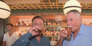 Arthur Laundy shares a beer with Ben Fordham after it was announced that Nine Entertainment sold its radio networks,including 2GB and 3AW.