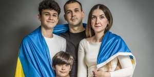 Natalia Boychyn with husband Petro and their two sons.