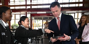 NSW Premier Chris Minns at Condell Park High School,where a phone ban has already been in place for 16 years.