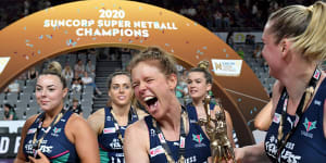 The Vixens celebrate their Super Netball grand final win. 