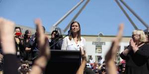 Brittany Higgins speaks at the March 4 Justice protest to rally against the Australian Parliament’s ongoing abuse and discrimination of women in Australia at Parliament House in Canberra on March 15.