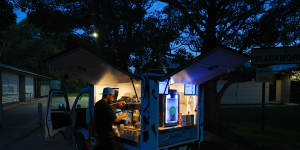 Gerome Creencia serves coffees between 9pm and 3am to hospital staff in Sydney.