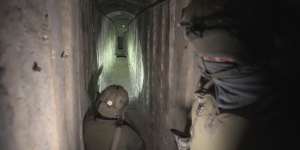 Israeli soldiers show the media a tunnel under Gaza City last month.