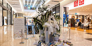 Floral tributes mark the anniversary of Bondi Junction Westfield stabbing.
