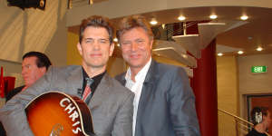 Richard Wilkins (right) with Chris Isaak.
