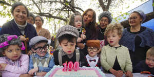 Three cheers as a hardy kindergarten reaches three figures with cake,song and costumes