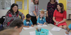 Education Minister Grace Grace (left),pictured with Premier and Olympics Minister Annastacia Palaszczuk (right),will need to accommodate concerns at East Brisbane State School as the Gabba is demolished.