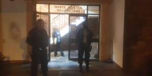 Police stationed outside White Castle Receptions,where the branch meeting took place.