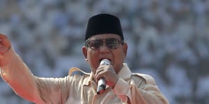 Strongman Prabowo preys on Indonesian insecurities in stadium rally pitch