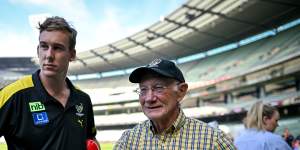 Tom Lynch,left,with Kevin Bartlett at the MCG on Monday. 