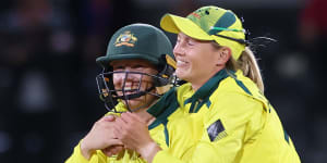 Meg Lanning and Alyssa Healy celebrate World Cup victory in Christchurch.