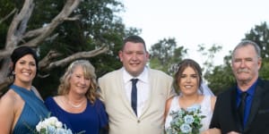 NSW Ambulance paramedic Steven Tougher on his wedding day,with wife Madison,parents Jillian and Jeff,and sister Jess.