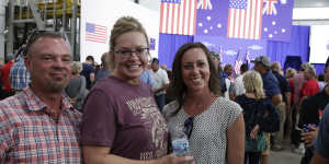 "I'm 52 years old and the growth of the economy is the best I've ever seen,so I'm real happy,"says Mike Schaub,pictured with Judy Schaub and Ashley Doty.