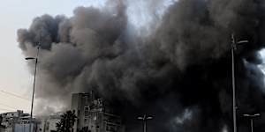 A building in Bachoura District in central Beirut is hit by an Israeli air strike.