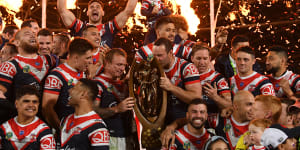 Grand moment:The Roosters set the stadium alight with a scintillating display to see off the Melbourne Storm.