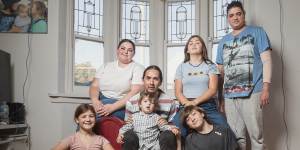 Single father David Glenny with his family,Satine,21,Celeste,15,Satine’s partner Chaze,(back row);and Uraia,12,Satine’s child Reimana,3,and Addicus,13,in their Maribyrnong home.