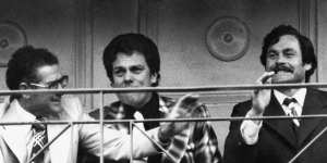 Barassi (right) enjoys the closing stages of North Melbourne’s 1975 VFL grand final win over Hawthorn with Bill Stephen (left) and Max Ritchie.