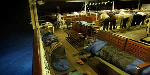 Activists sleep and pray on the Turkish passenger ship MV Marmara carrying 600 activists,part of the freedom flotilla headed to Gaza.