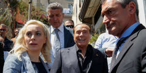 Forza Italia president Silvio Berlusconi,centre,with his partner Marta Fascina,left.