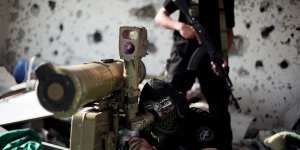 A Hamas fighter at an emplacement in the Shujaya neighborhood of Gaza City in 2014.