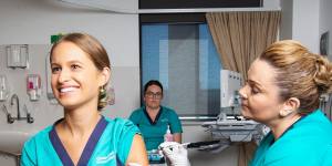 Quarantine,Border Force and healthcare workers all began receiving their first COVID-19 vaccines on Monday.