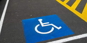 Disabled parking:the blue stickers are meant for people with a disability.