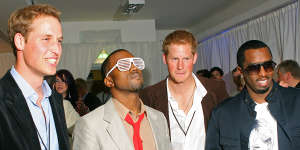 Prince William,Kanye West,Prince Harry and P Diddy pose for the media during a backstage party at Wembley Arena in north in 2007.