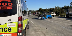 Car lands on roof,M1 traffic delays peak at 30km