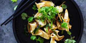 Stir-fried squid with ginger and spring onion.