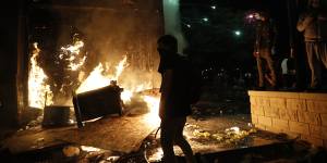 Protesters set fires at the third precinct station of the Minneapolis Police Department.