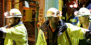 Todd Russell (left) and Brant Webb emerge from the Beaconsfield mine after 14 days trapped underground in 2006.