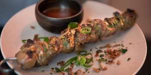 Lemongrass chicken skewer with coconut and tamarind. 