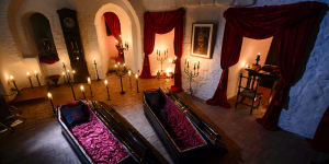 In this picture taken Oct. 9,2016,two coffins are lit before a photo shoot in Bran Castle,in Bran,Romania. Airbnb has launched a contest to find two people to stay overnight in the castle on Halloween,popularly known as Dracula?s castle because of its connection to the cruel real-life prince Vlad the Impaler,who inspired the legend of Dracula. (AP Photo/Andreea Alexandru)