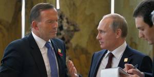 Tony Abbott and Vladimir Putin at the APEC meeting in Beijing in 2014. 