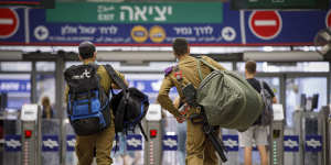 Prospects for violence:Israeli soldiers at Hashalom train station in Tel Aviv.