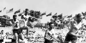 Trevor Vincent (no. 4) of Australia and Maurice (no.9) of England jumping in the steeplechase at the Commonwealth Games in Perth,November 1962.