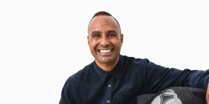 Former Socceroo Archie Thompson on Friday,with 13 soccer balls,representing the 13 goals he scored against American Samoa in a world record in 2001.