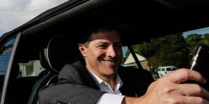 Former NSW finance minister Victor Dominello using his FuelCheck app. 