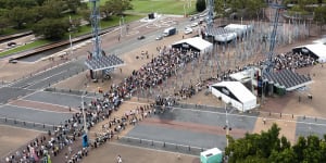 Taylor Swift fans line up at Olympic Park on Wednesday morning to buy merchandise ahead of her Sydney concert on Friday.