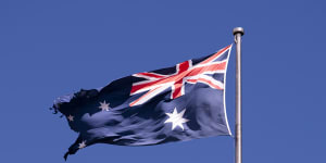 Miserable fate awaits flag that battled worst Canberra could deliver