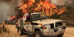 Tasmania Parks and Wildlife Service fighting a bushfire at Miena in January.