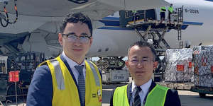 Risland Australia's CEO Dr Guotao Hu (left) farewelling 90 tons of medical supplies about to be flown to Wuhan,China.