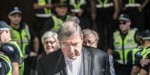 Cardinal George Pell leaving court in 2018.