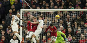 Tottenham’s Richarlison,left,scores his side’s opening goal against Manchester United.