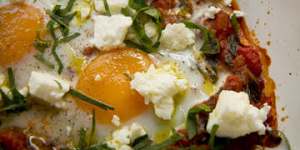 Baked eggs,spiced tomato and feta.