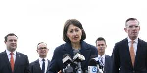 Changing of the guard:then-Premier Gladys Berejiklian with Dominic Perrottet at Badgerys Creek in June. 