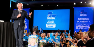 Prime Minister Scott Morrison speaks to an ecstatic crowd at a Liberal Party rally on Sunday.