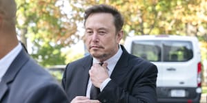 Elon Musk arrives for a meeting of tech CEOs to discuss the priorities and risks of AI.