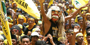 Golkar was the dominant political party during Suharto’s New Order regime. Here supporters attend a rally in Bali in 2004.